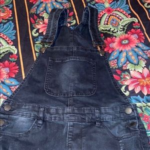 black ripped overalls